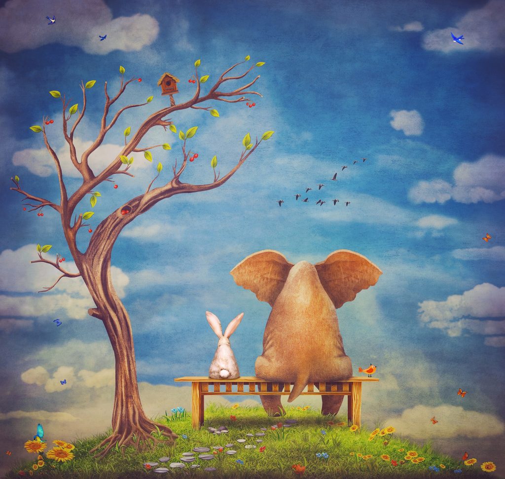 Sad elephant sitting on a bench on the glade