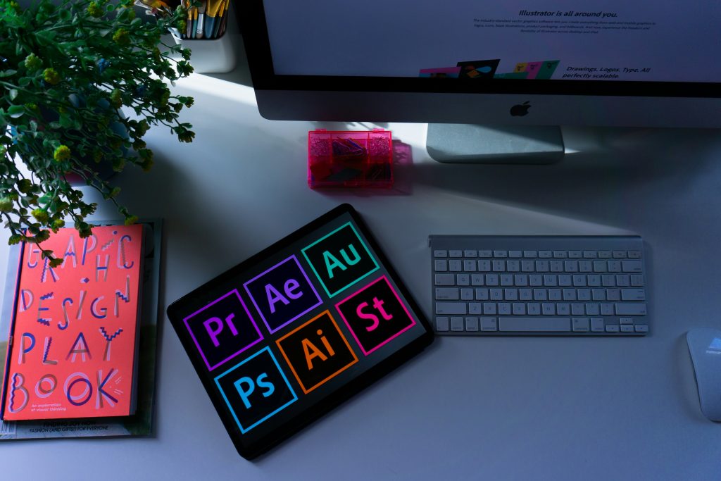 Desktop with logos on it and a keyboard
