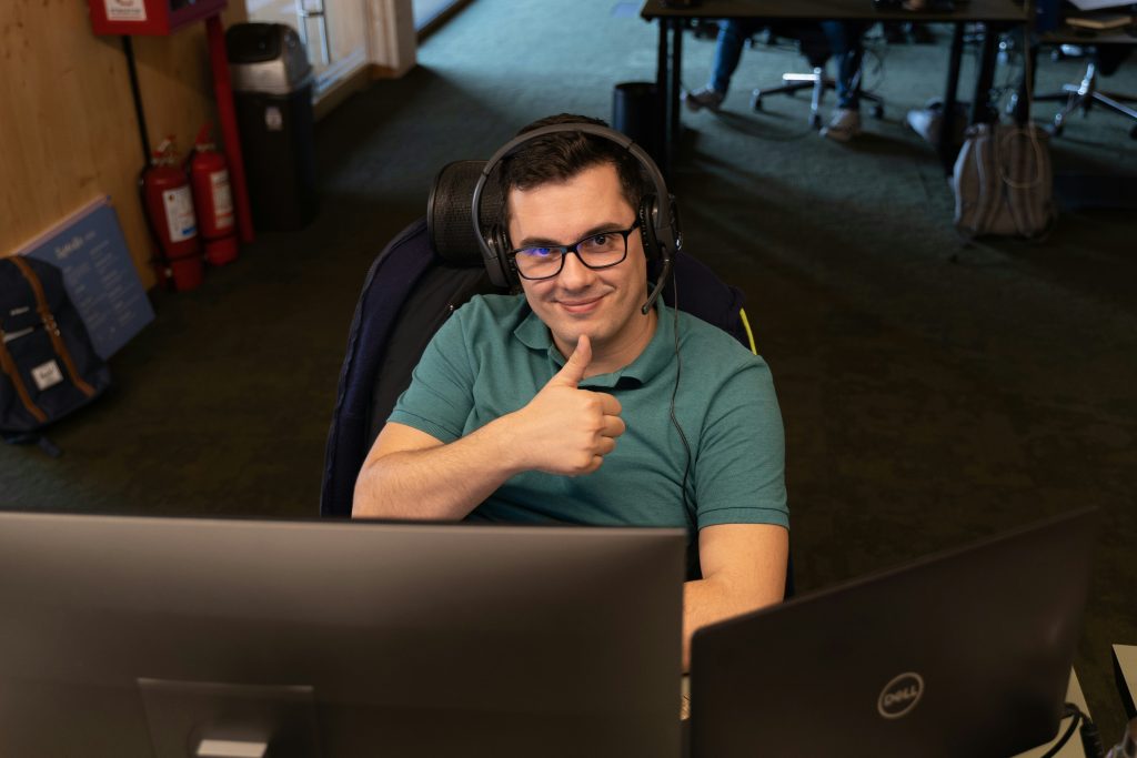 Man giving thumbs up sign