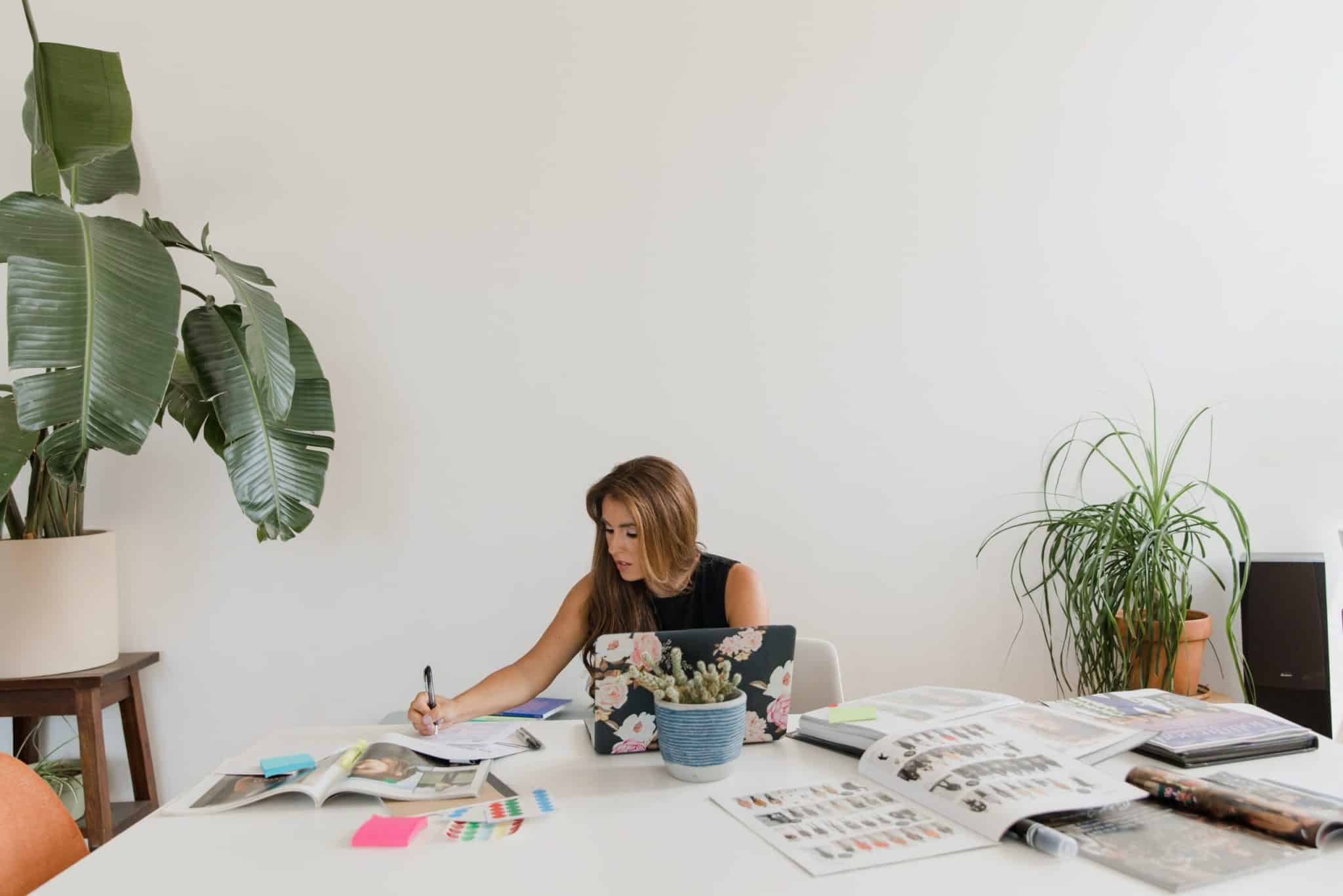 stock-photo-of-designer-working-on-creating-a-magazine