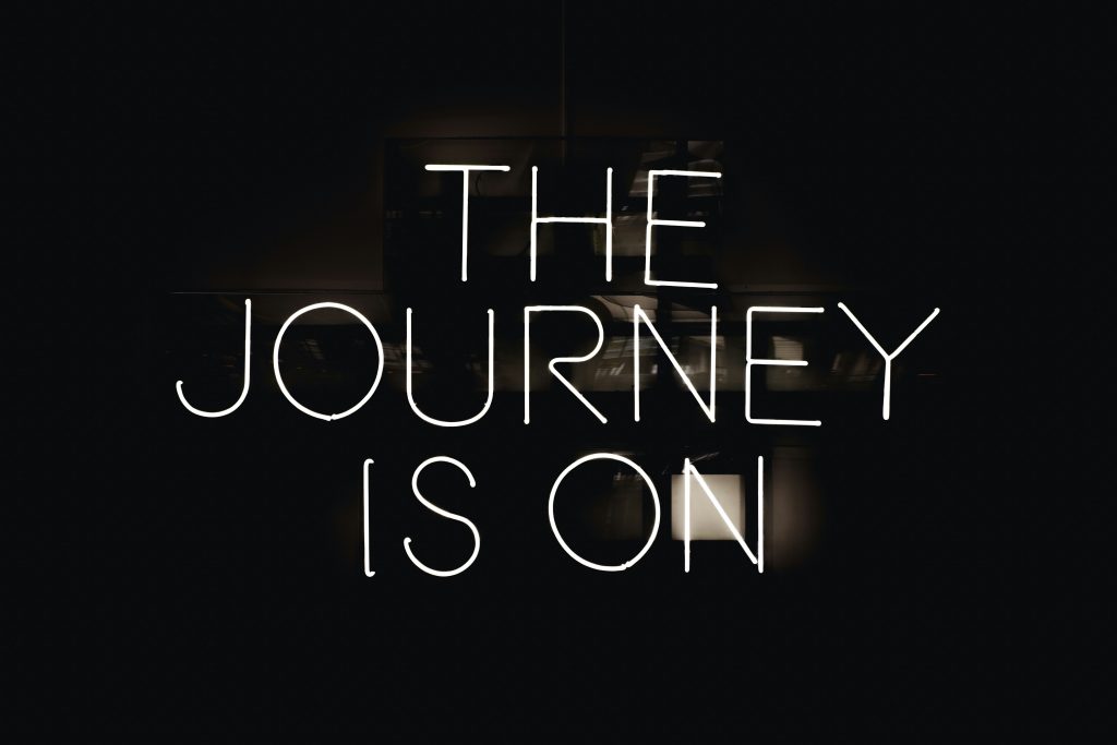 Sign that says The Journey Is On