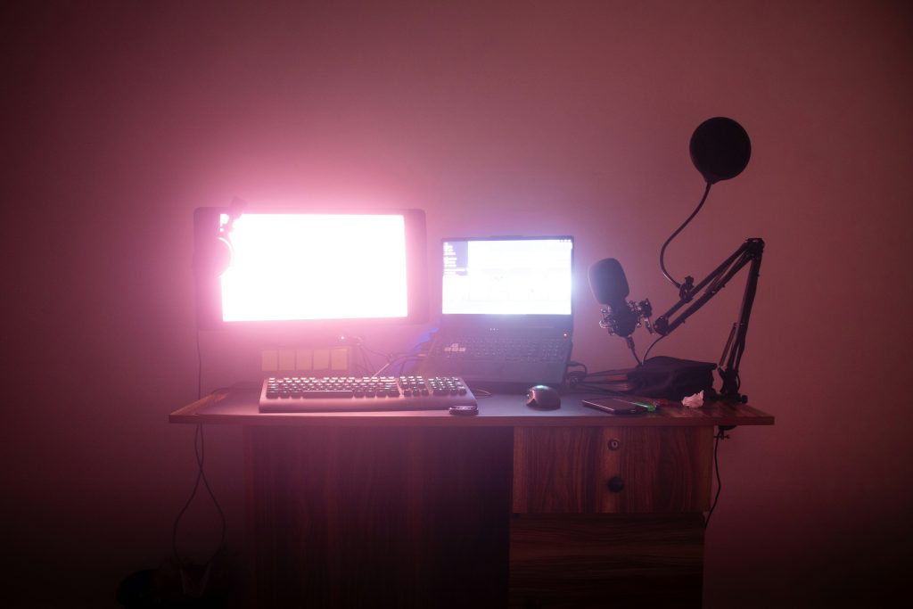 computer screens in darkish room