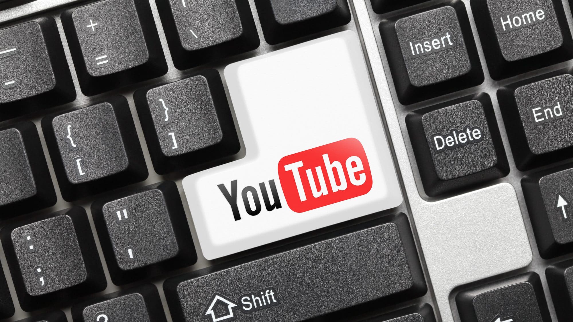 Close-up view on conceptual keyboard - YouTube (key with logotype)