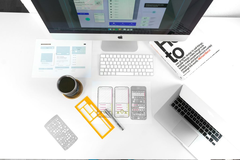 Desk with coffee and computers
