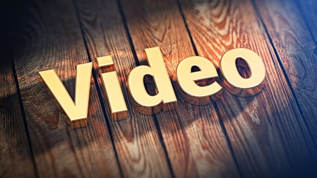 The word "Video" is lined with gold letters on wooden planks. 3D illustration picture