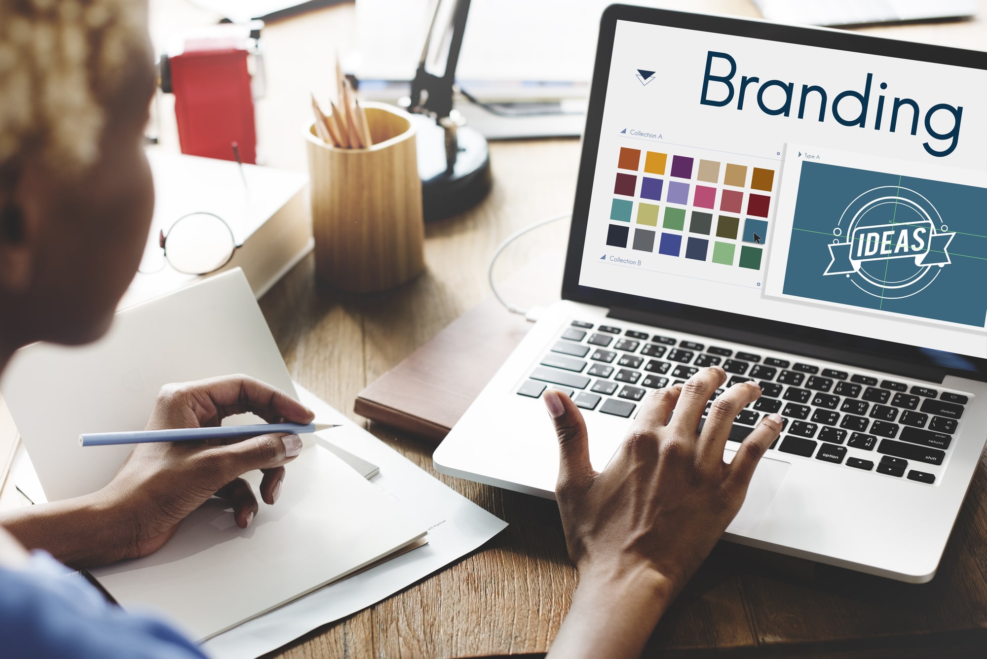 stock-image-of-person-designing-a-branding-guide
