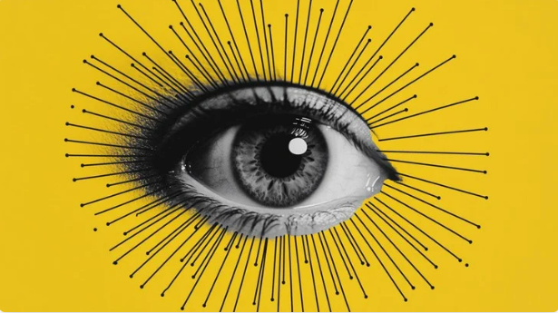 A photo with a yellow background and an eyeball in the center